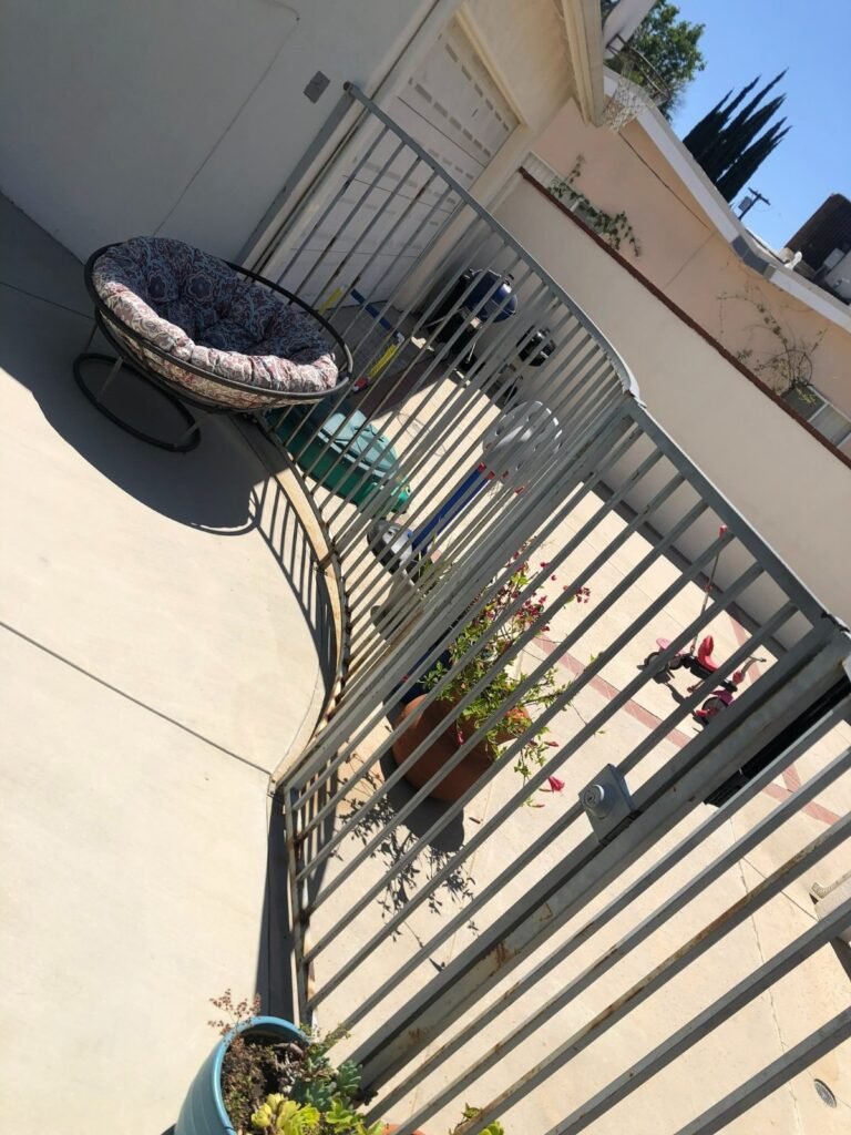 Steel picket balcony railing on an apartment patio in Lake Balboa