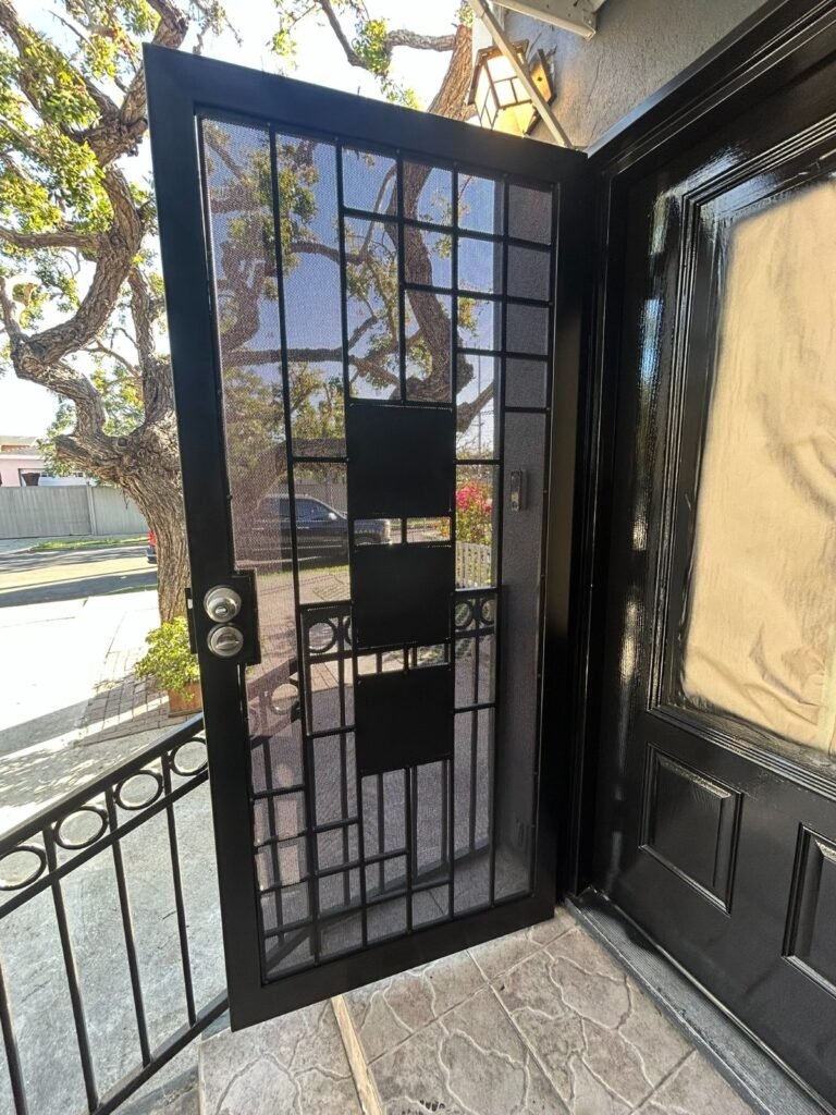 Wrought iron security entry door with glass panels in South Pasadena